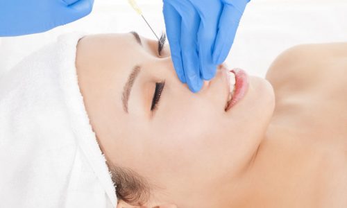 26963304 - woman is doing cosmetic surgery injections